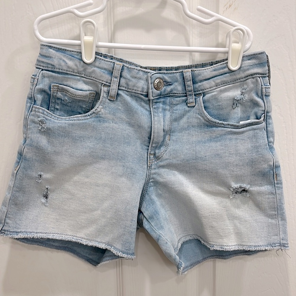 Super soft distressed denim shorts. Girl size 12 midi shorts.